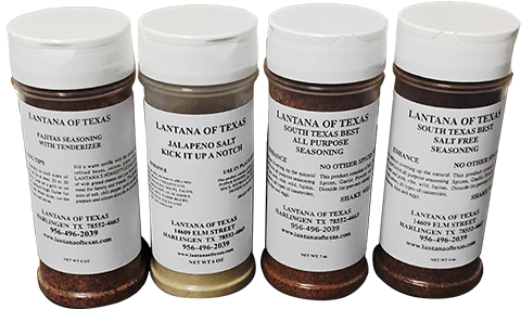 Four spice bottles labeled with different seasonings from Lantana of Texas, displayed in a row against a white background.